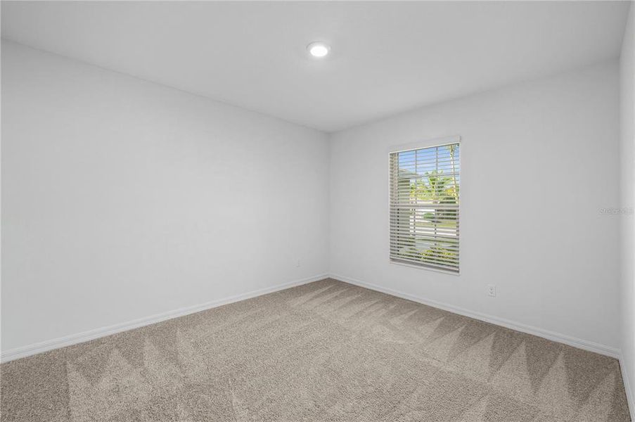 Spacious, unfurnished interior of a new home in , Port Charlotte (Image 13).