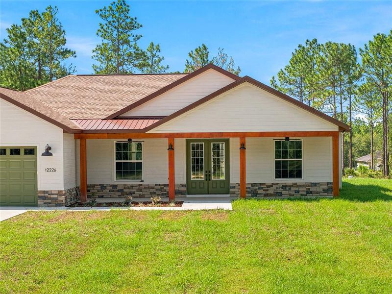 Front exterior of a new home in , Dunnellon, FL, highlighting curb appeal (Image 23).