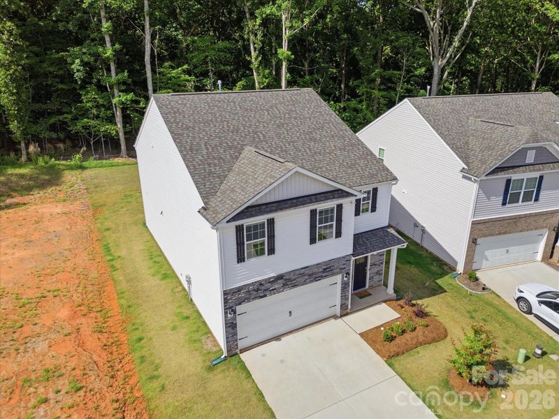 Exterior details and patio area of a home in Reedy Creek Preserve, Charlotte (Image 30).