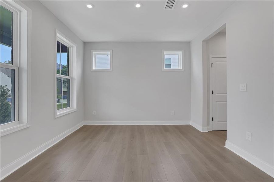 Spacious, unfurnished interior of a new home in The Paddocks at Doc Hughes, Buford (Image 35).