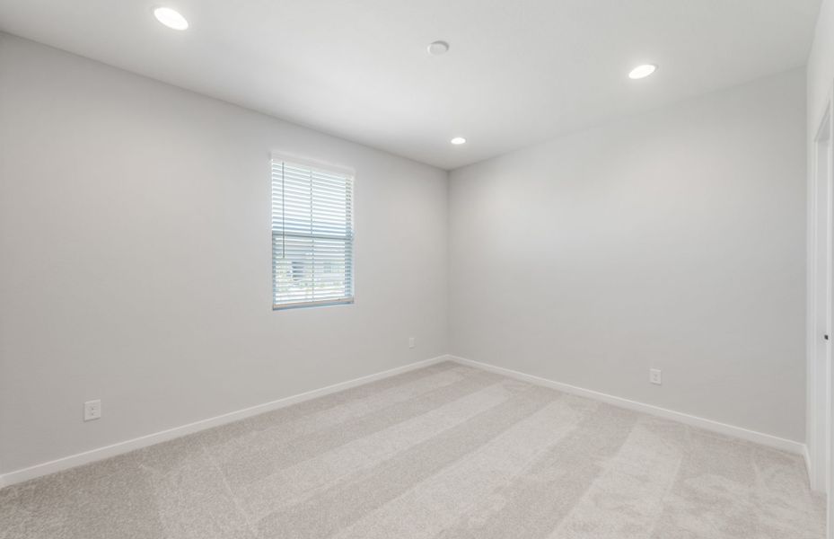 Spacious, unfurnished interior of a new home in Blossom Rock, Apache Junction (Image 23).