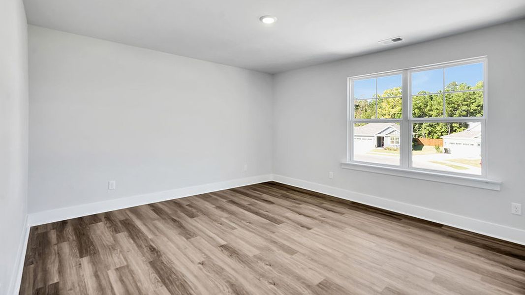 Spacious, unfurnished interior of a new home in The Haven at Indigo Preserve, Leland (Image 27).