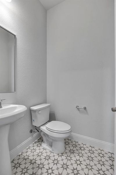 Bathroom with toilet and sink