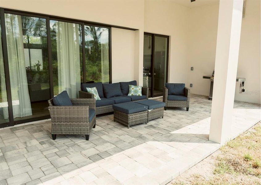 Exterior details and patio area of a home in , North Port (Image 27).