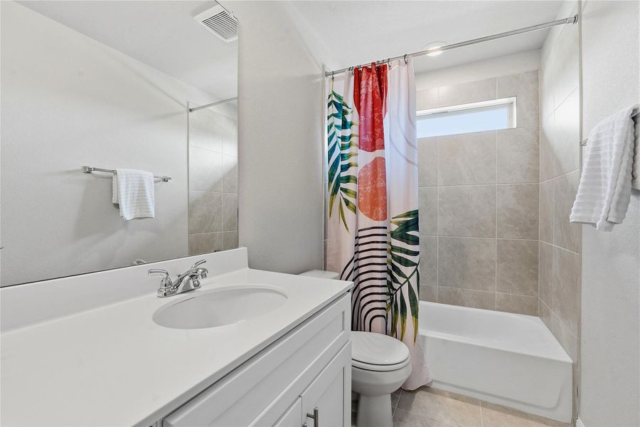 Furnished interior view inside a new home in Crosswinds, Kyle (Image 19).