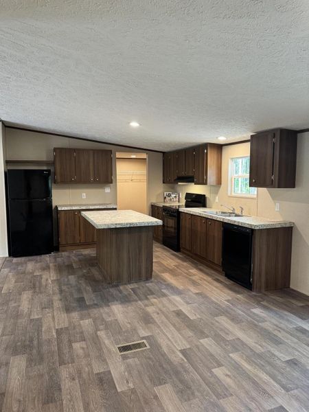 Furnished interior view inside a new home in , Ravenel (Image 15).