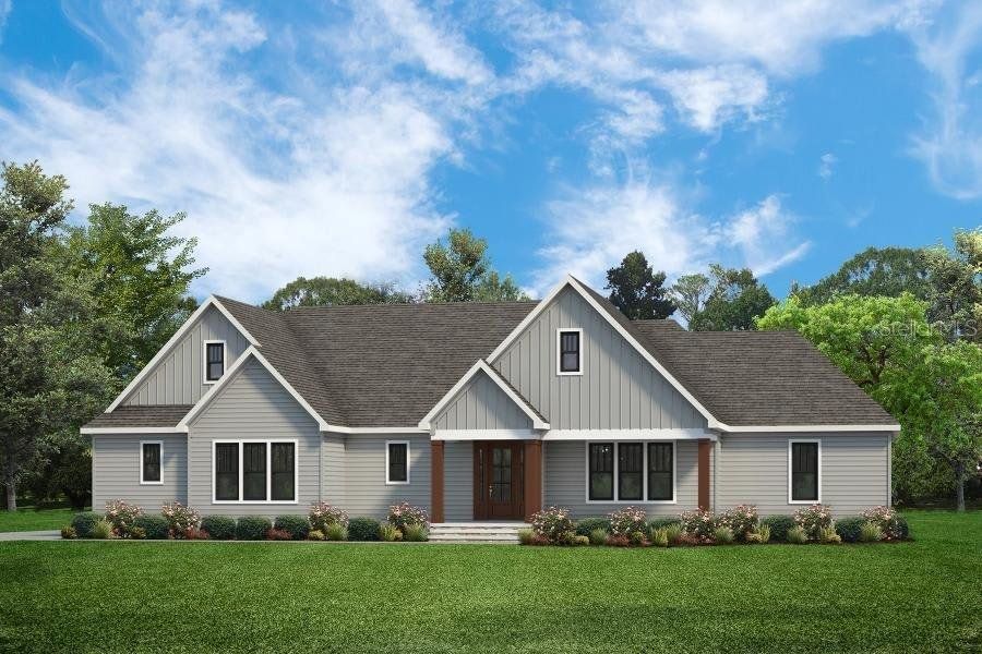 Front exterior of a new home in , Palm Coast, FL, highlighting curb appeal (Image 4). Front exterior of a new home in , Palm Coast, FL, highlighting curb appeal (Image 4).