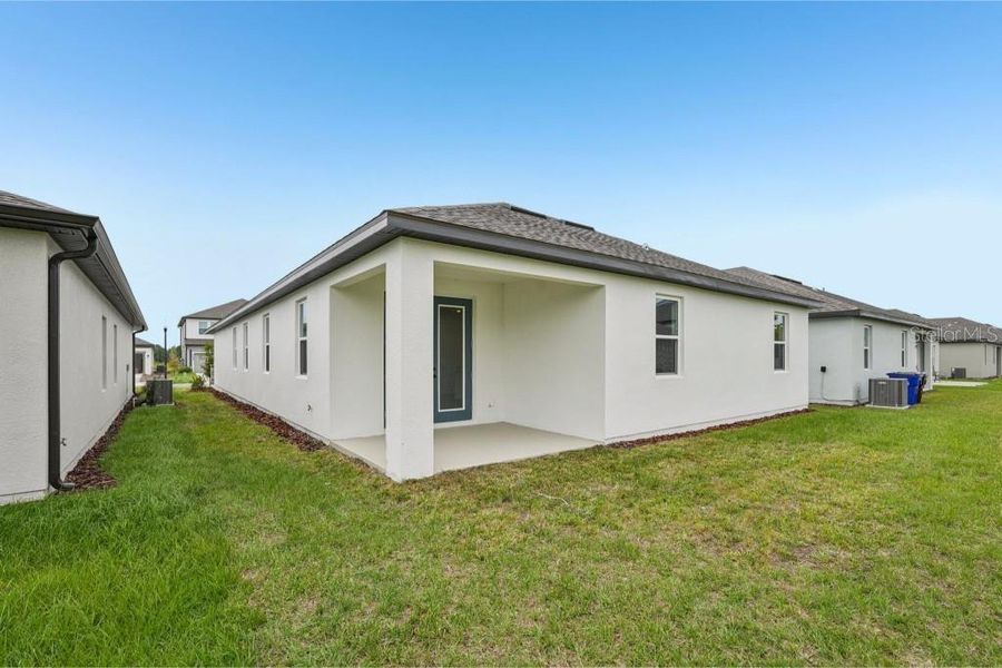 Exterior details and patio area of a home in Sunbrooke, St. Cloud (Image 3). Exterior details and patio area of a home in Sunbrooke, St. Cloud (Image 3).