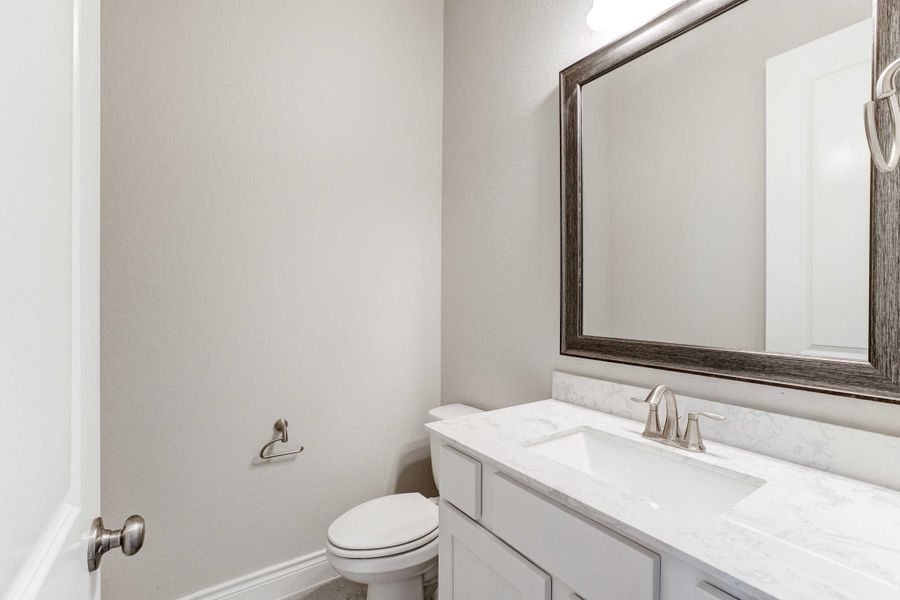 Representative furnished interior of a home built from the 2688 by Ravenna Homes in The Woodlands Hills 65′, Willis (Image 4).