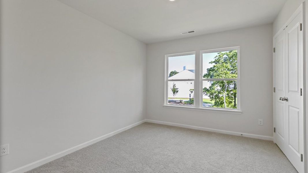 Representative unfurnished interior of a home built from the LANSING - TRADITIONS by D.R. Horton in Chapel Townes, Raleigh (Image 25).