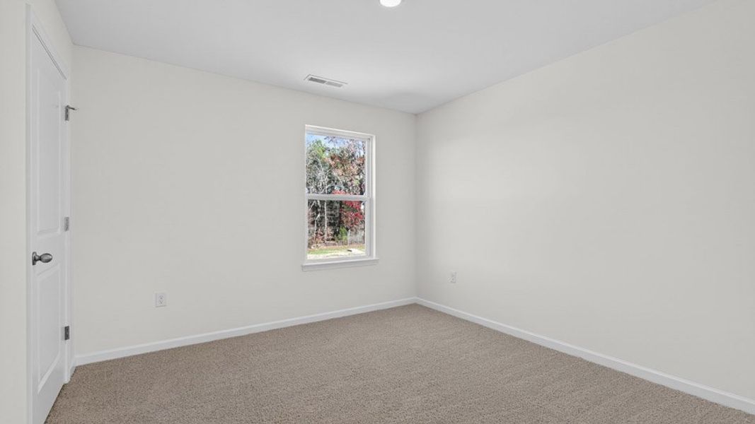 Spacious, unfurnished interior of a new home in Baker Farm, Youngsville (Image 24).