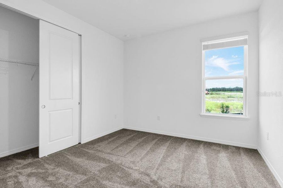 Spacious, unfurnished interior of a new home in Ardisia Park, New Smyrna Beach (Image 21).