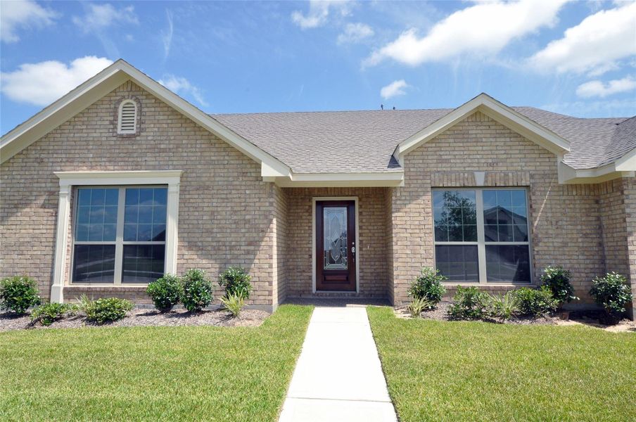 Front exterior of a new home in , League City, TX, highlighting curb appeal (Image 22). Front exterior of a new home in , League City, TX, highlighting curb appeal (Image 22).