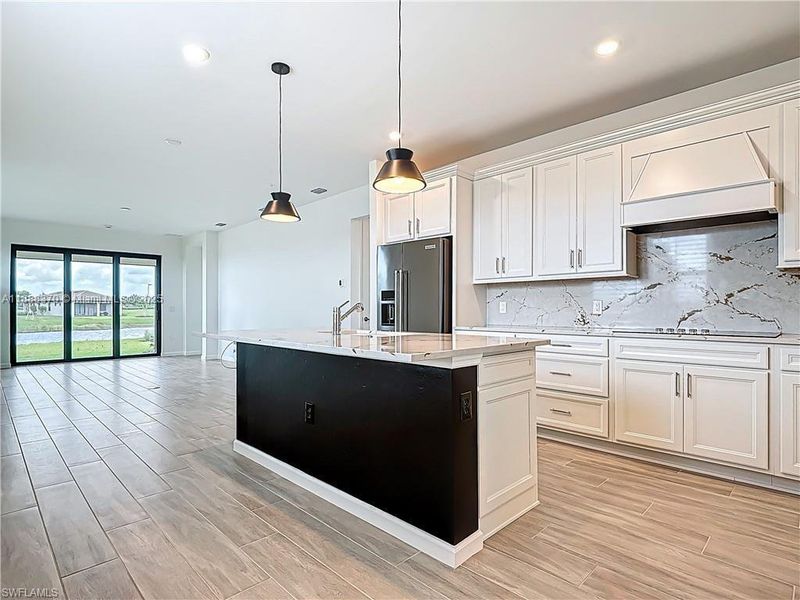 Furnished interior view inside a new home in , Ave Maria (Image 8).