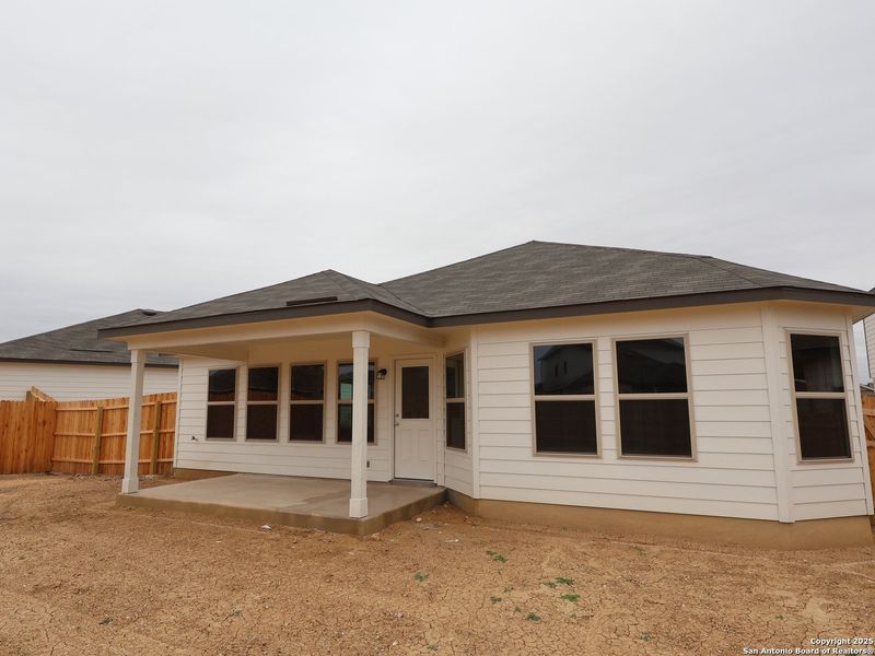 Exterior details and patio area of a home in Winding Brook, San Antonio (Image 16).