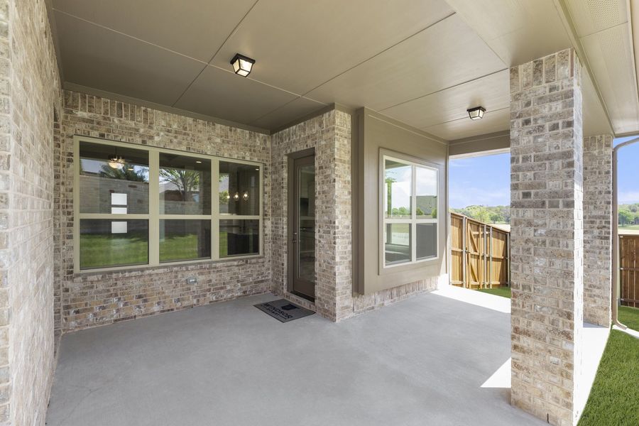 Exterior details and patio area of a home in Providence Cove, McKinney (Image 3). Exterior details and patio area of a home in Providence Cove, McKinney (Image 3).