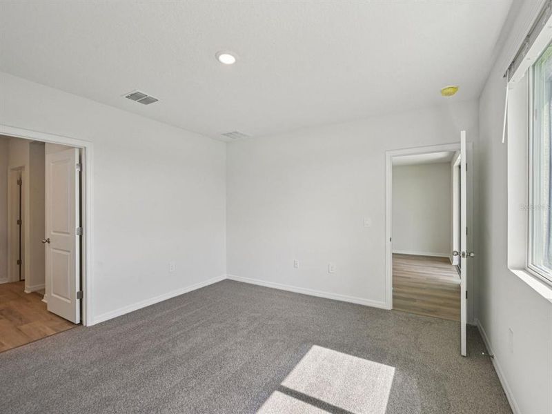 Spacious, unfurnished interior of a new home in Coasterra - Premier Series, Palmetto (Image 15).