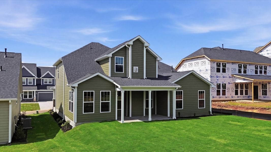 Vibrant rear outdoor space featuring a covered porch and exceptional craftsmanship by DRB Homes Vibrant rear outdoor space featuring a covered porch and exceptional craftsmanship by DRB Homes