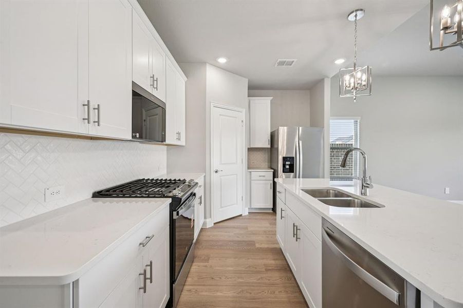 Furnished interior view inside a new home in Eastridge - Signature Series, McKinney (Image 13).
