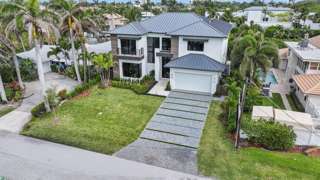 Front exterior of a new home in , Delray Beach, FL, highlighting curb appeal (Image 10).