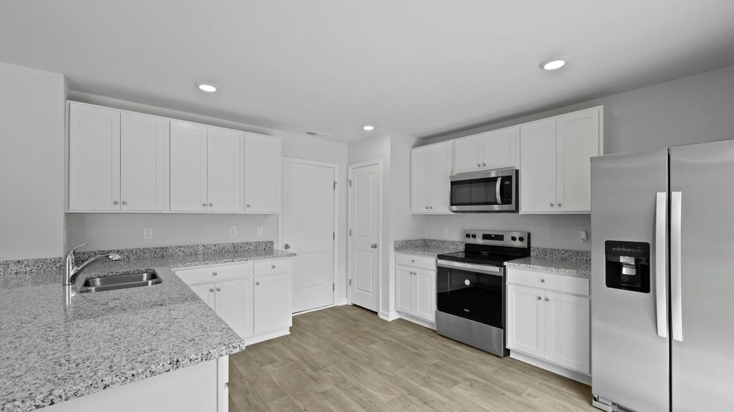 Representative furnished interior of a home built from the BRANDON by D.R. Horton in Center Pointe, Santee (Image 5).