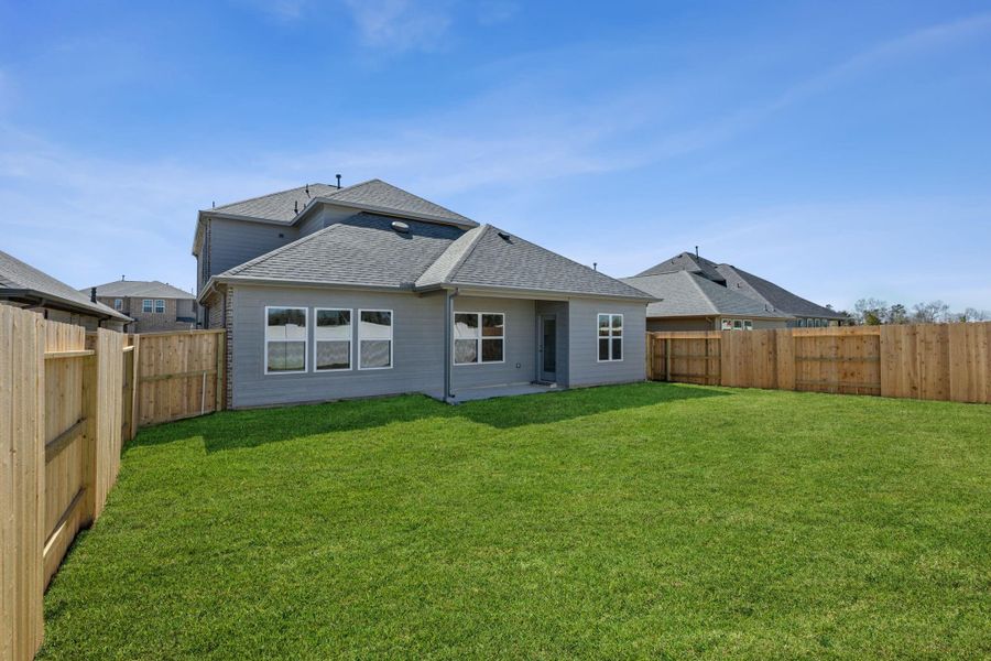 Front exterior of a new home in Saint Tropez, Huffman, TX, highlighting curb appeal (Image 22). Front exterior of a new home in Saint Tropez, Huffman, TX, highlighting curb appeal (Image 22).