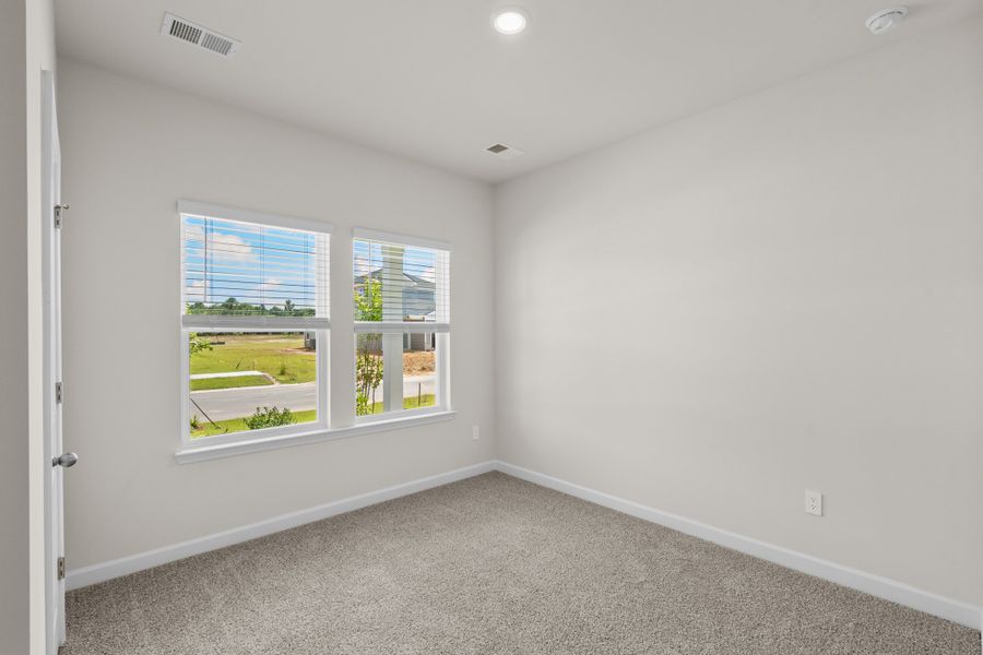 Spacious, unfurnished interior of a new home in Cypress Ridge - The Coastline Series, Longs (Image 25).