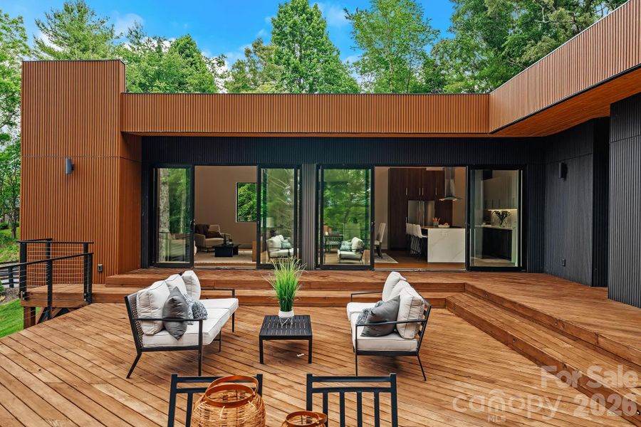 Exterior details and patio area of a home in , Mills River (Image 25).