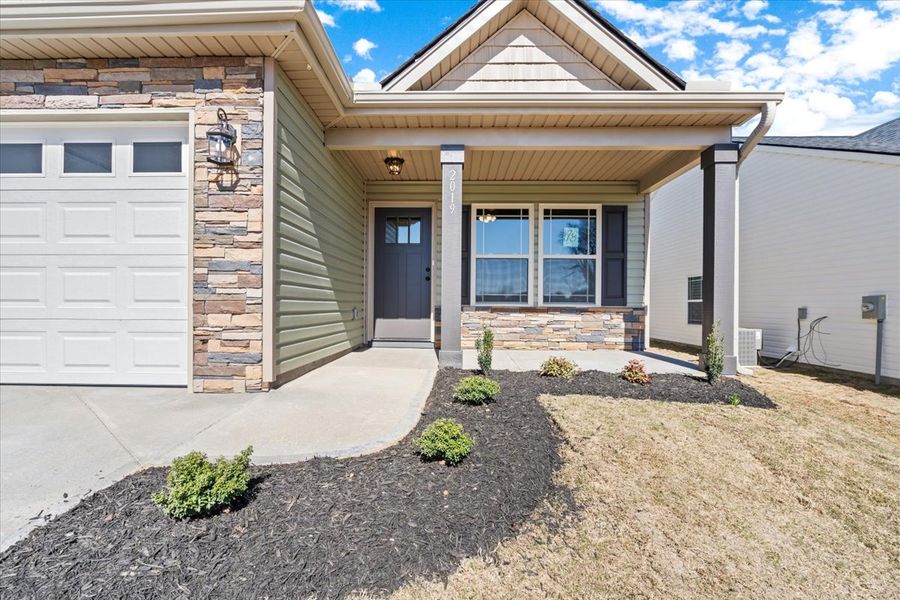 Representative exterior photo of a completed home built from the Wellford by Enchanted Homes in Hampshire Heights, Moore, SC (Image 23).
