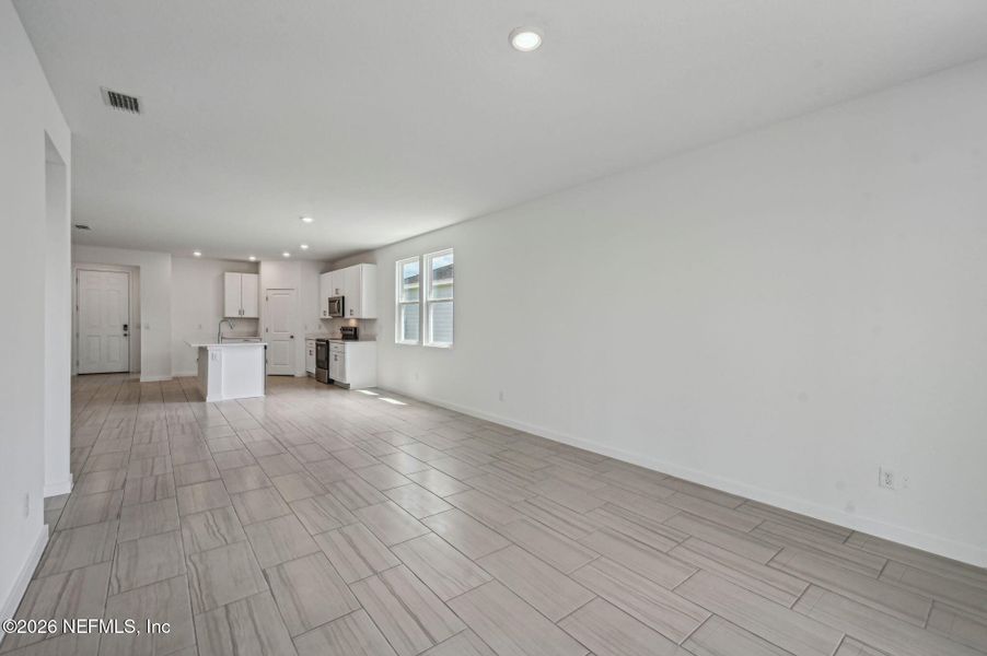 Spacious, unfurnished interior of a new home in Lakes at Bella Lago - Signature Series, Green Cove Springs (Image 26).
