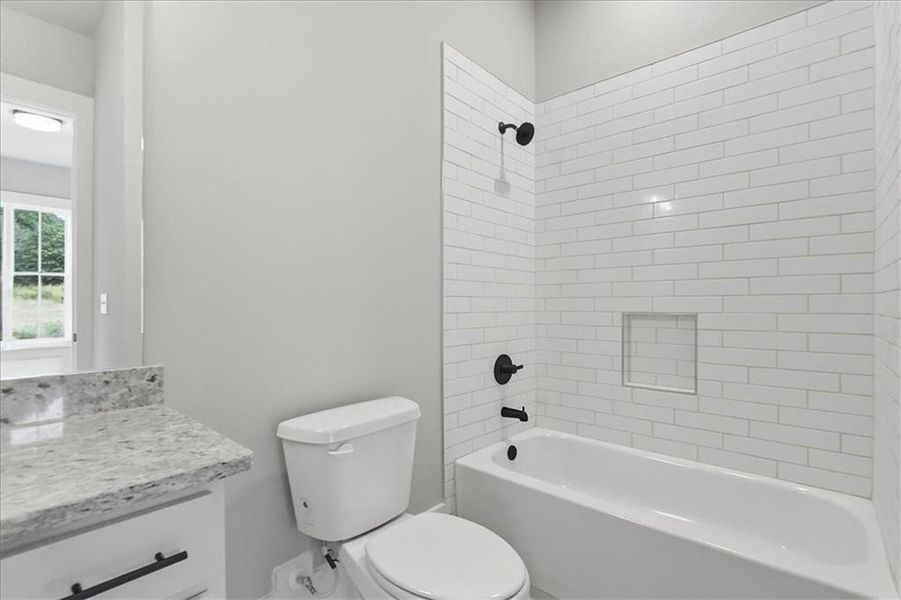 Furnished interior view inside a new home in Old Town Estates, Monroe (Image 7).