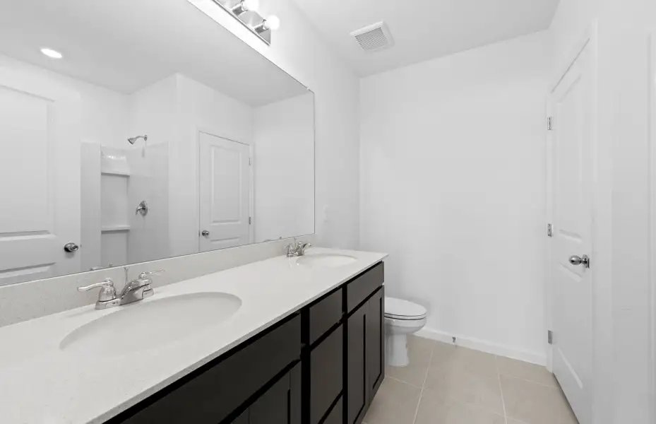 Furnished interior view inside a new home in Caloosa Cove, Labelle (Image 4).