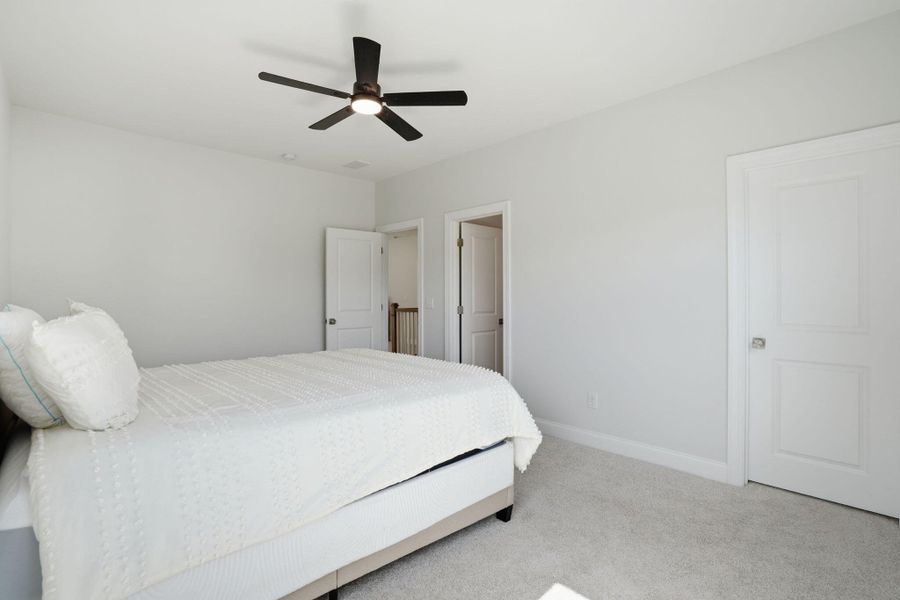 Furnished interior view inside a new home in Tidewater at Lakes of Cane Bay, Summerville (Image 7).