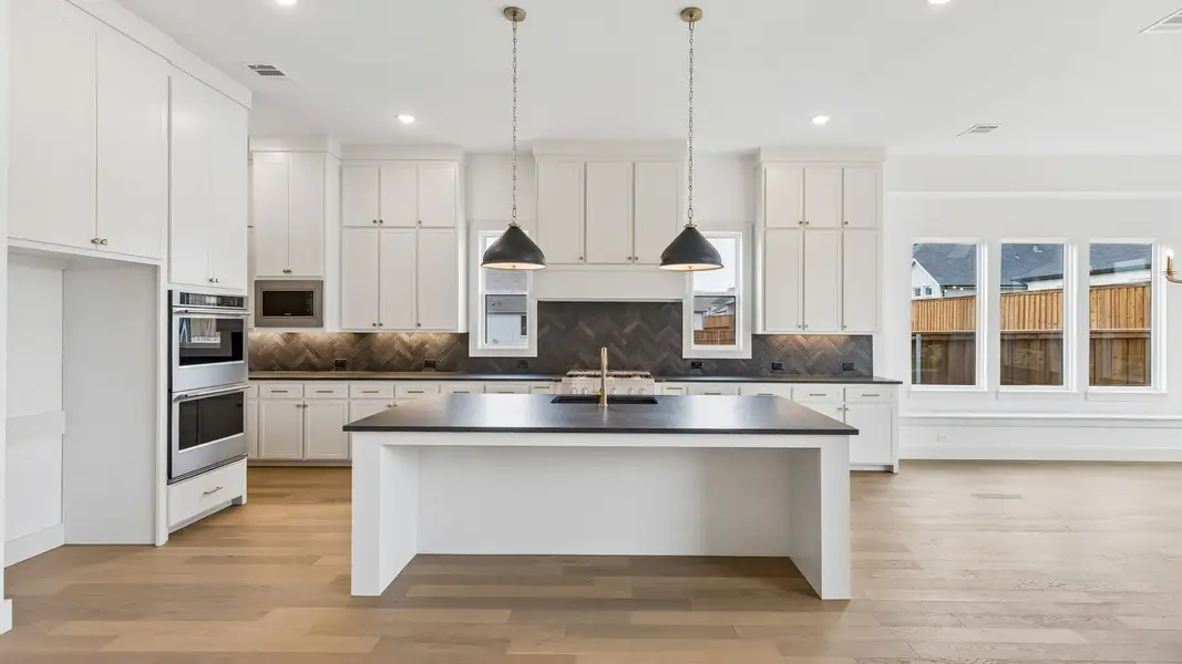 Representative furnished interior of a home built from the Colton by Southgate Homes in The Reserve at Watters, Allen (Image 6).