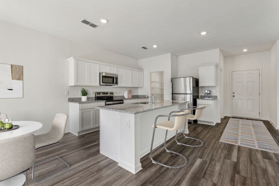 Representative furnished interior of a home built from the Neptune by Starlight Homes in Castlewood South, Taylor (Image 2). Representative furnished interior of a home built from the Neptune by Starlight Homes in Castlewood South, Taylor (Image 2).