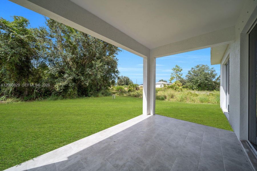 Exterior details and patio area of a home in , Lehigh Acres (Image 3).