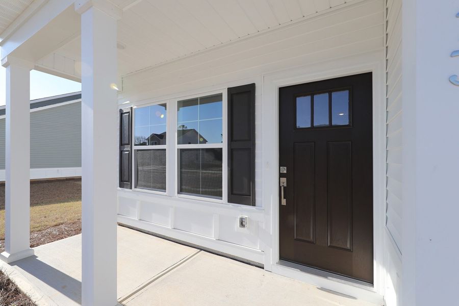 Exterior details and patio area of a home in Hainer Place, Conway (Image 3).