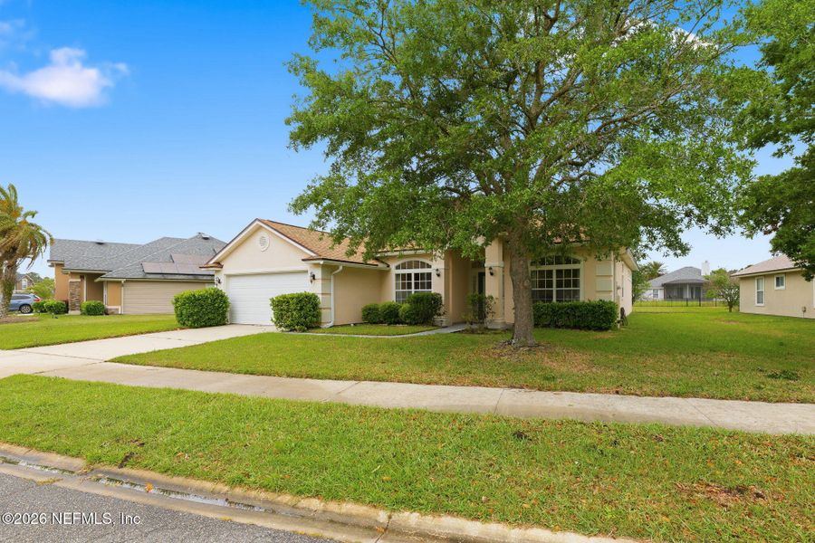 Front exterior of a new home in , Jacksonville, FL, highlighting curb appeal (Image 22).