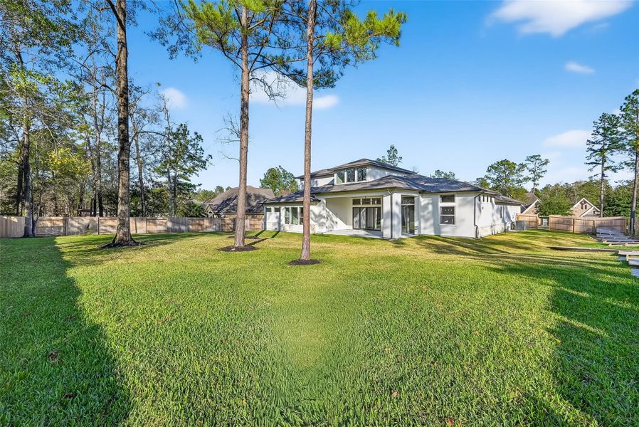 Exterior details and patio area of a home in Stewart’s Forest, Conroe (Image 27). Exterior details and patio area of a home in Stewart’s Forest, Conroe (Image 27).