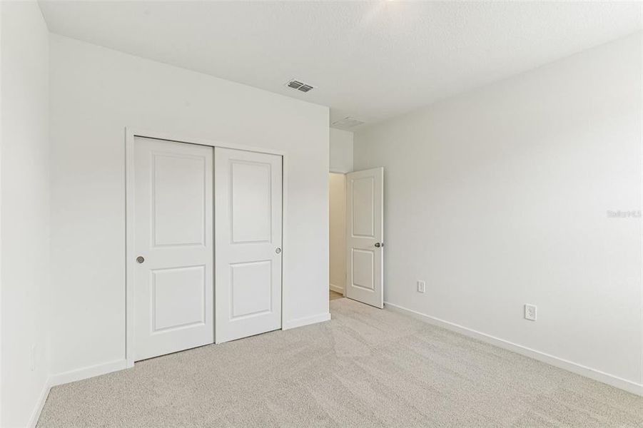 Spacious, unfurnished interior of a new home in Colbert Landings, Palm Coast (Image 16).