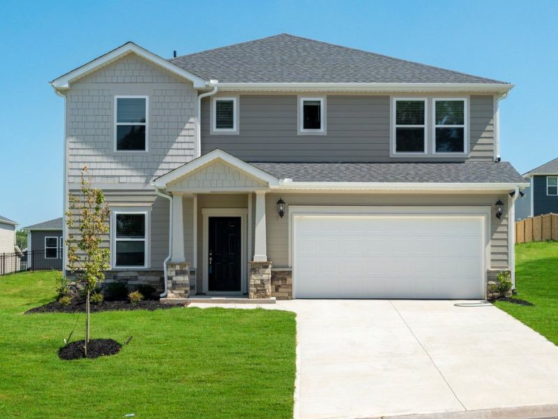 Front exterior of a new home in Chestnut Grove, Greer, SC, highlighting curb appeal (Image 1).