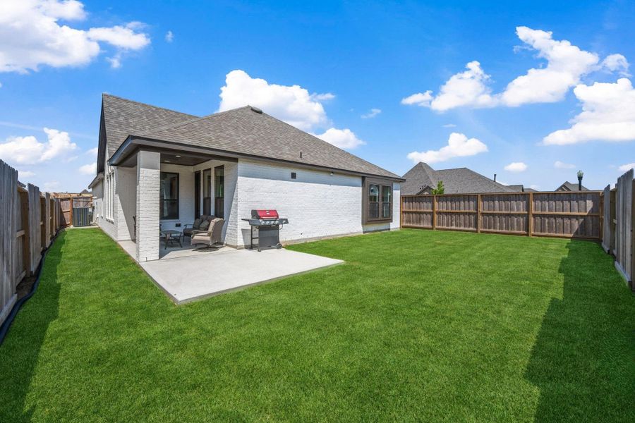 Front exterior of a new home in Riceland: 50ft. lots, Mont Belvieu, TX, highlighting curb appeal (Image 1). Front exterior of a new home in Riceland: 50ft. lots, Mont Belvieu, TX, highlighting curb appeal (Image 1).