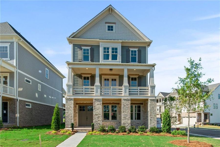 Front exterior of a new home in , Woodstock, GA, highlighting curb appeal (Image 1).