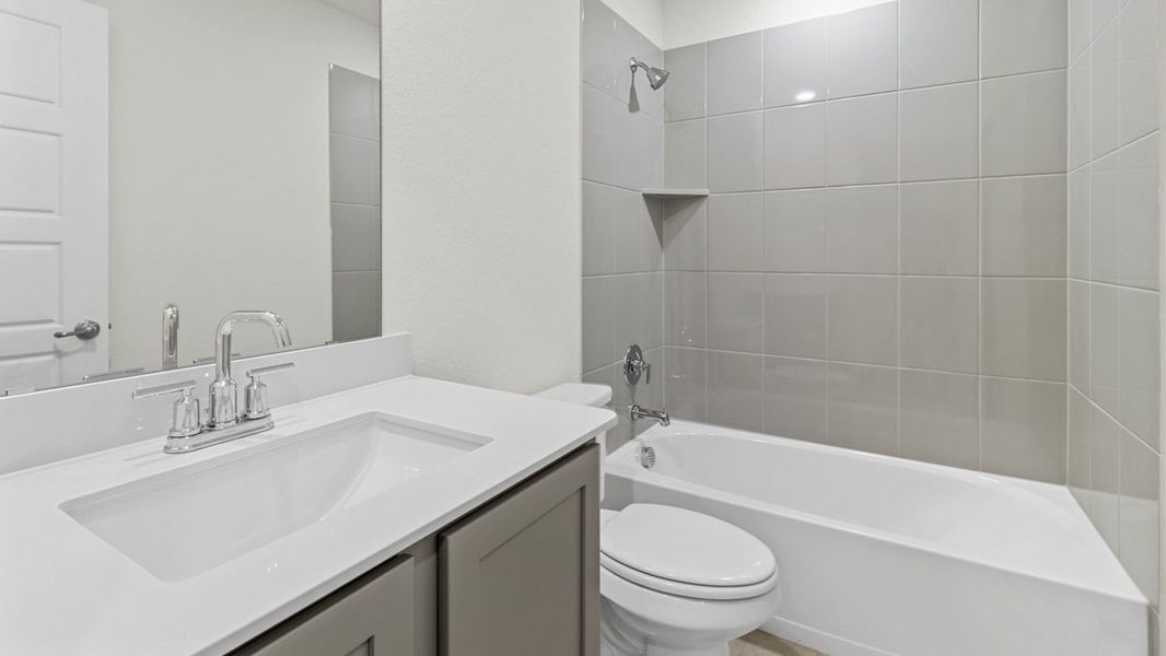 Furnished interior view inside a new home in Woodcreek, Fate (Image 7).