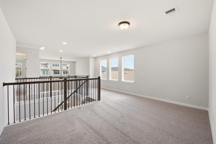 Spacious, unfurnished interior of a new home in Heritage, Dripping Springs (Image 19).