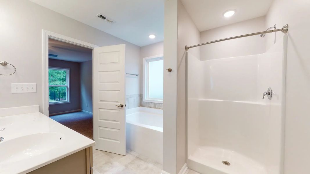 Representative furnished interior of a home built from the Kids 2 Car by JC Jackson Homes,LLC in Heritage Pointe, Newport (Image 5).