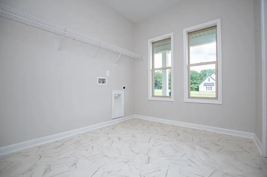 Spacious, unfurnished interior of a new home in WOODMONT RESERVE, Roopville (Image 72).