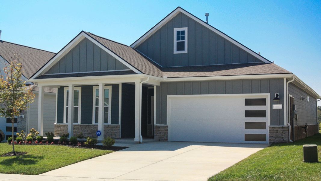 Front exterior of a new home in Nexus South, Gallatin, TN, highlighting curb appeal (Image 2). Front exterior of a new home in Nexus South, Gallatin, TN, highlighting curb appeal (Image 2).