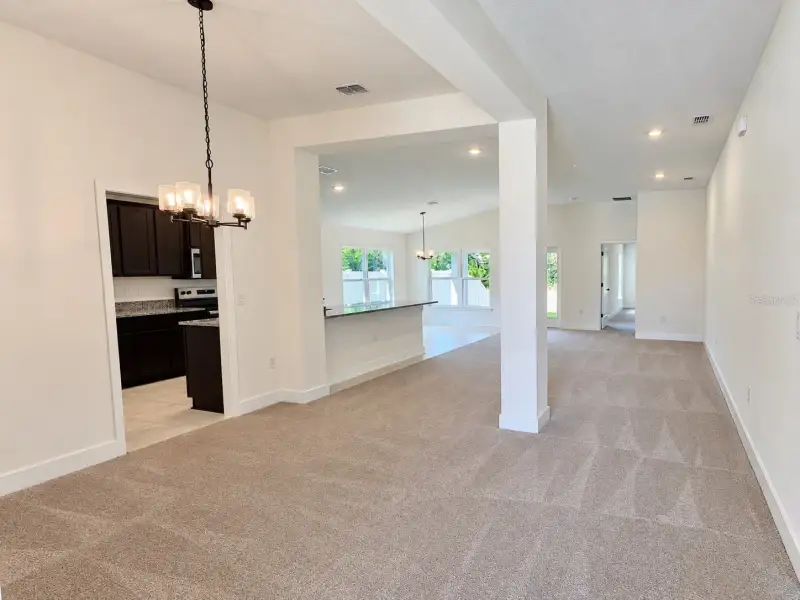 Spacious, unfurnished interior of a new home in Harmony Central, Harmony (Image 8).