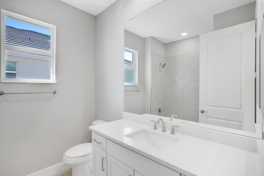 Furnished interior view inside a new home in Lake Park at Tradition, Port St. Lucie (Image 11).